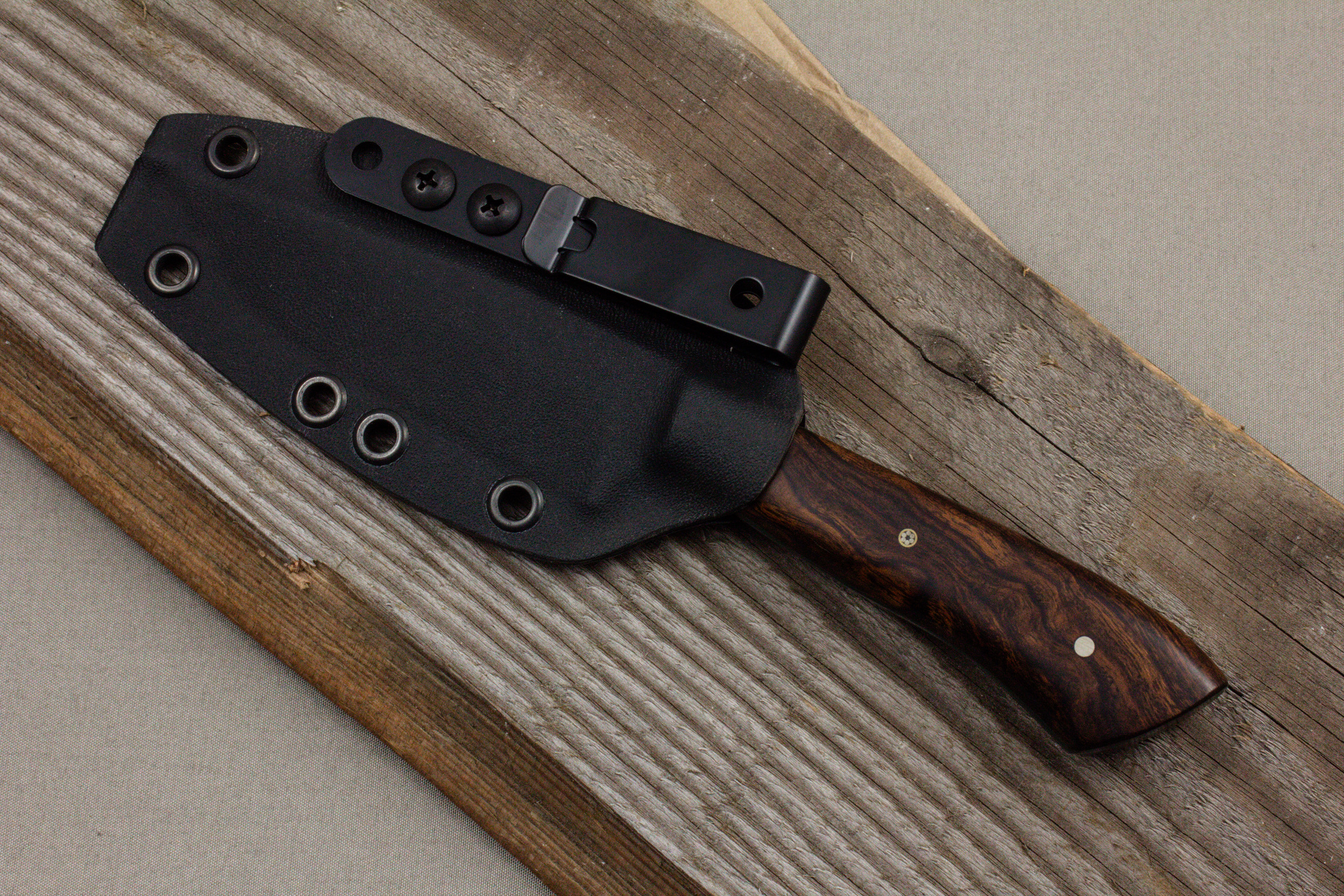 Ridge Runner hunting knife with black Kydex sheath and belt clip